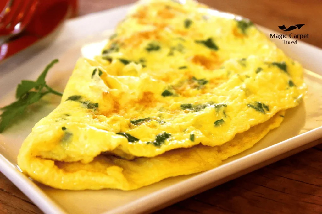 Eggah is an traditional Egyptian dish that consists of eggs, herbs, and vegetables.