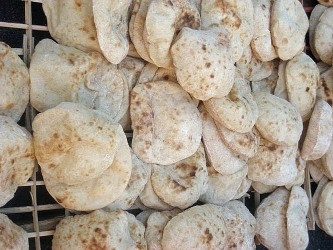 Aesh baladi is the traditional Egyptian bread and a staple thing in every meal.