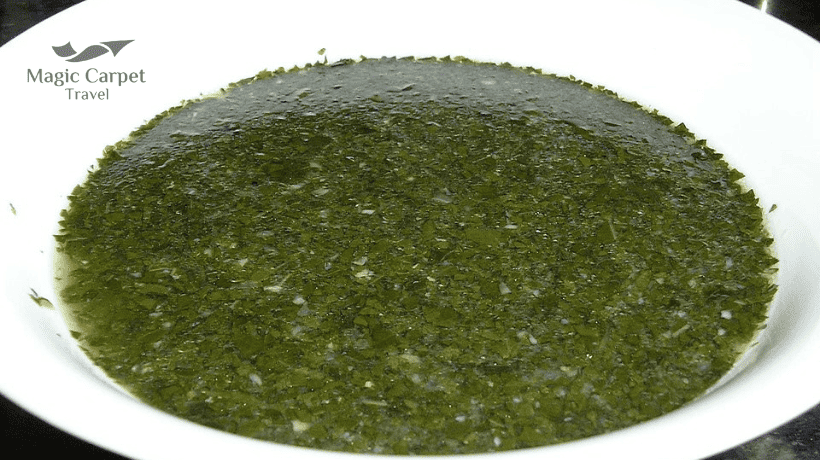 Molokhia is an Egyptian stew and consists of molokhia leafs cooked with garlic and coriander.