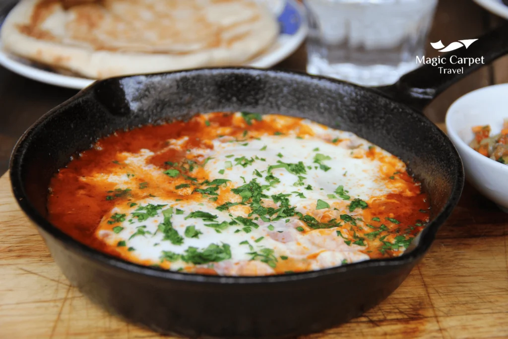 Shakshuka is one of the most delicate Egyptian dishes and is made of soft-boiled eggs mixed with tomato sauce.