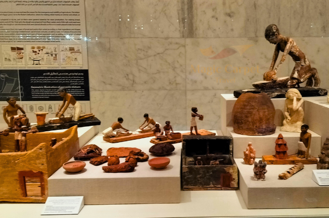 Ancient Egyptian artifacts describe bread making process at the National Museum of Egyptian Civilization tour.